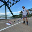 Load image into Gallery viewer, A man on a bridge playing Sauce Toss