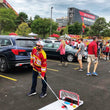 Load image into Gallery viewer, A man at a sporting event playing Sauce Toss