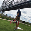 Load image into Gallery viewer, A man under a bridge holding a Sauce Toss Net