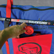 Load image into Gallery viewer, a hand putting a puck into a bag