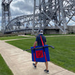 Load image into Gallery viewer, A man walking down the sidewalk with a Sauce Toss Travel Bag