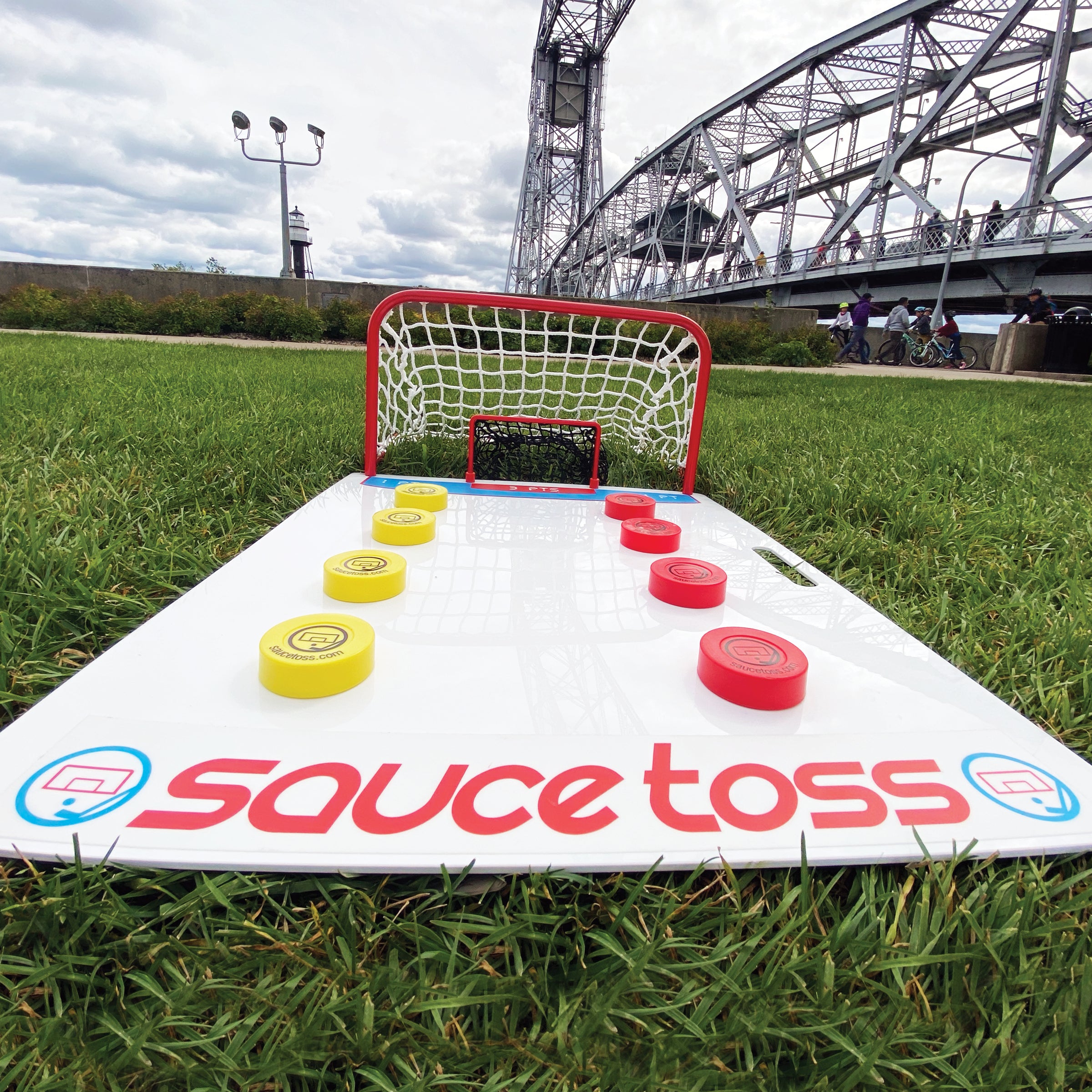 A Sauce Toss Board in the Grass In Duluth